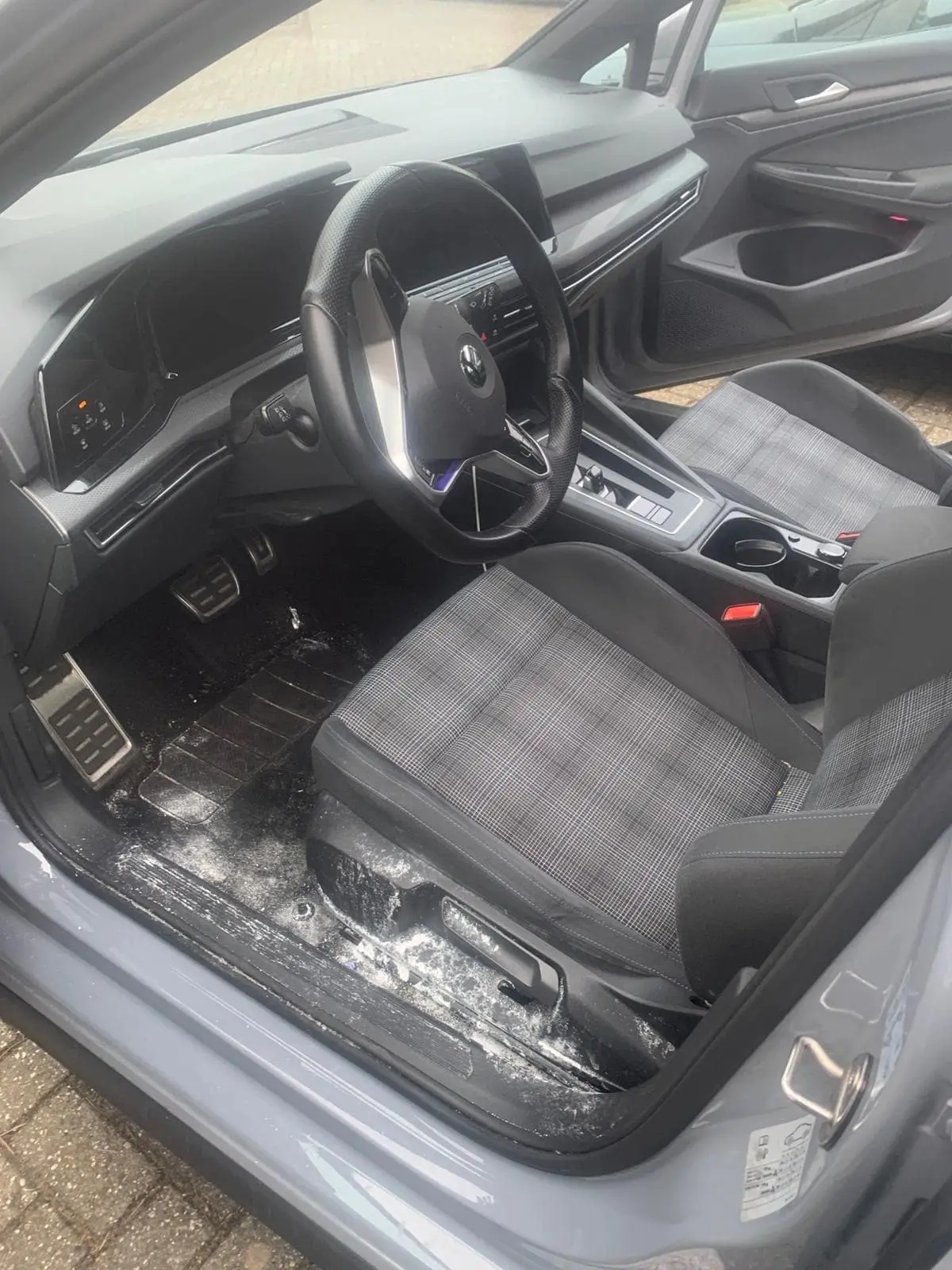 Car seat before cleaning, with visible stains
